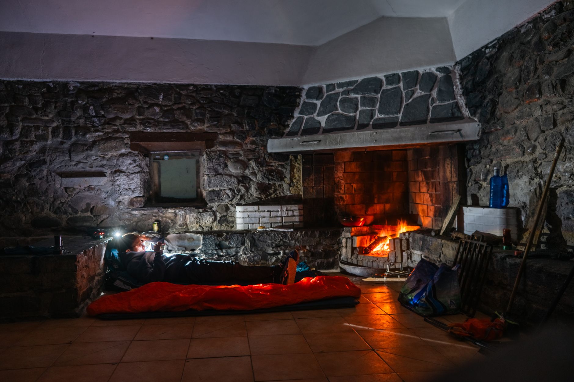 Warm fire in mountain shelter living room